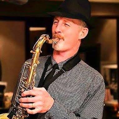 Barry Snyman performing on saxophone
